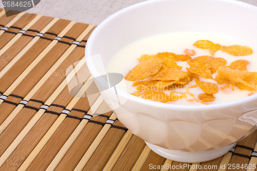 Image of Healthy breakfast. Bowl with corn flakes.