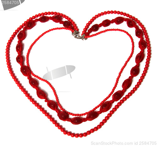 Image of red necklace in heart shape isolated on white background