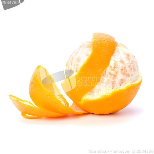 Image of orange with peeled spiral skin isolated on white background