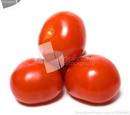 Image of red tomato isolated  on white background 