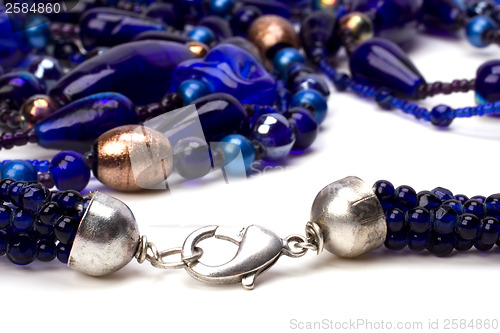 Image of blue beads isolated on white background