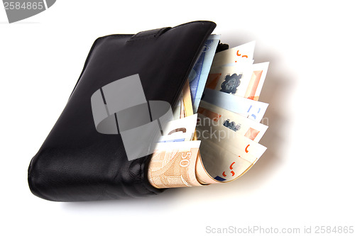 Image of Money in leather  purse isolated on white  background 