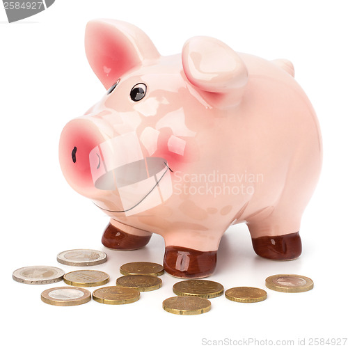 Image of Business concept. Lucky piggy bank isolated on white background.