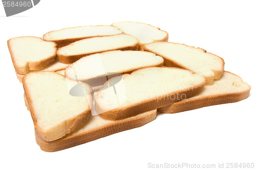Image of sliced baguette isolated on white  
