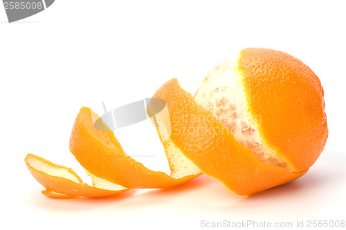 Image of orange with peeled spiral skin isolated on white background