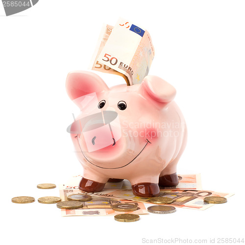 Image of Business concept. Lucky piggy bank isolated on white background.