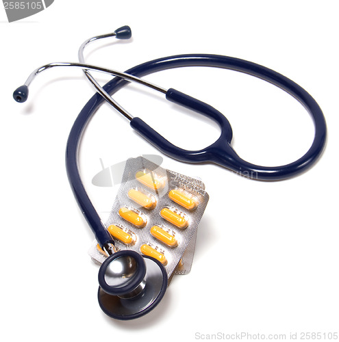 Image of stethoscope and tablets isolated on white background