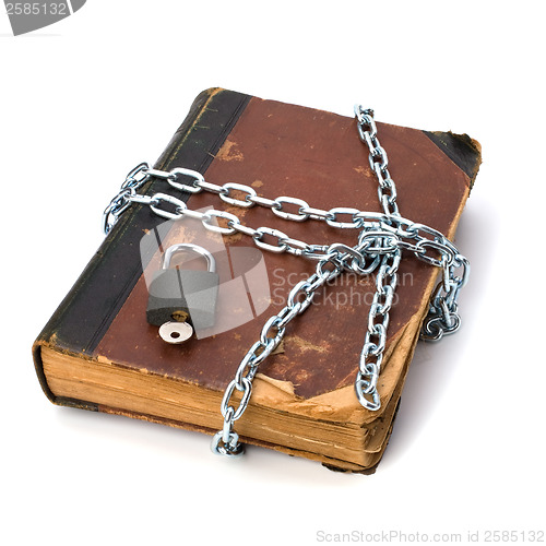 Image of tattered book with chain and padlock isolated on white backgroun