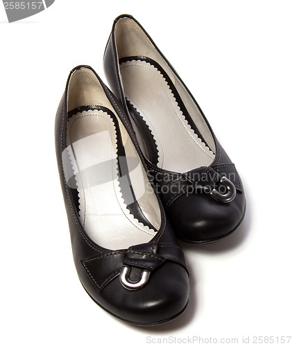 Image of female shoes with buckle isolated in white background