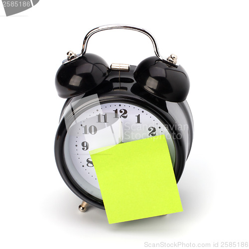 Image of Alarm clock with sticky paper 
