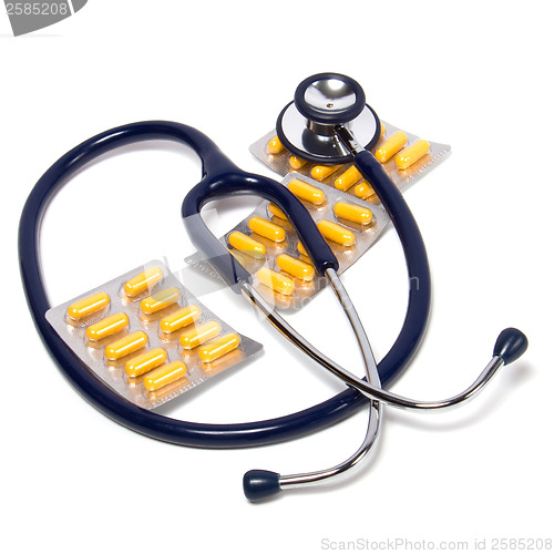 Image of stethoscope and tablets isolated on white background