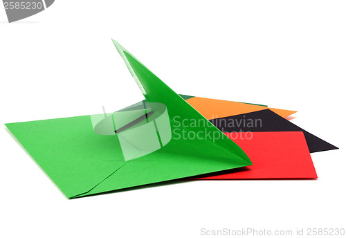 Image of green envelope with cards isolated on white background