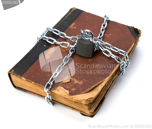 Image of tattered book with chain and padlock isolated on white backgroun