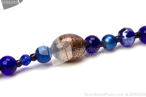 Image of blue beads isolated on white background