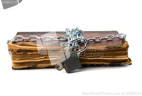 Image of tattered book with chain and padlock isolated on white backgroun