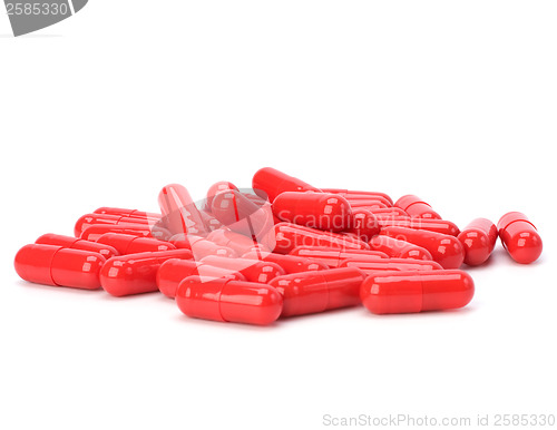 Image of red capsules isolated on white background