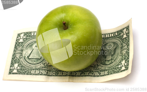 Image of Apple and money isolated.  Health concept