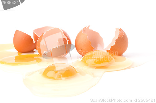 Image of broken eggs isolated on white background