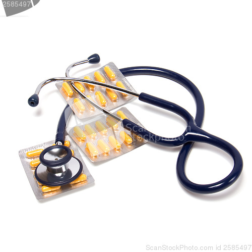 Image of stethoscope and tablets isolated on white background