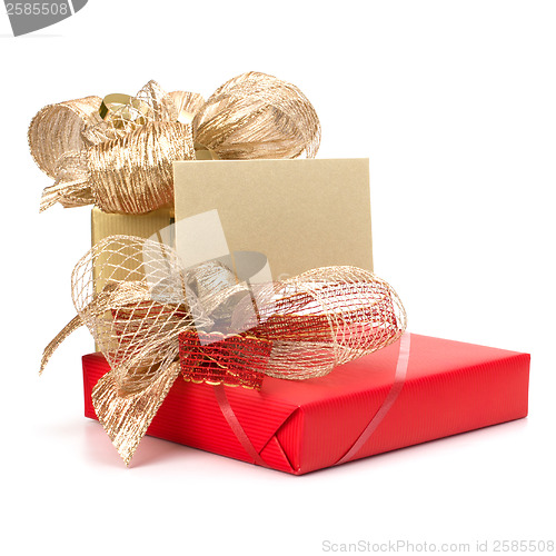 Image of 
Luxurious gifts with note isolated on white background 
