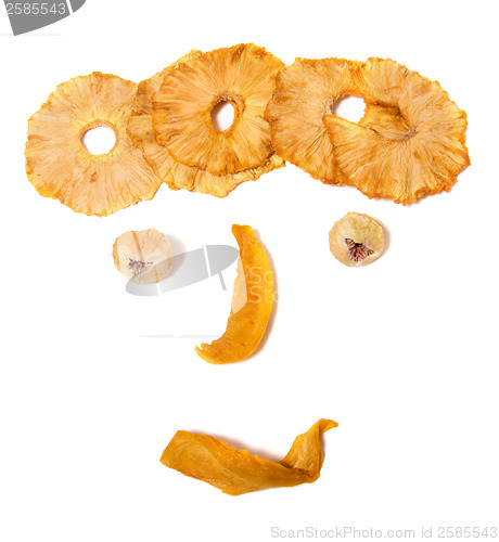 Image of human face imitation with dried fruits isolated on white backgro