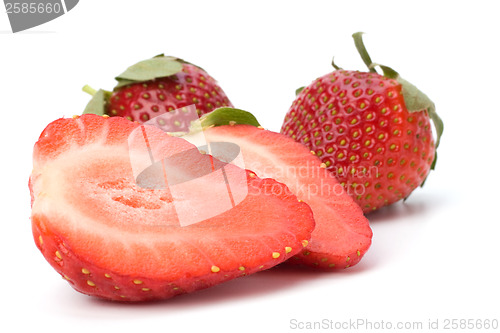 Image of Halved strawberries isolated on white background