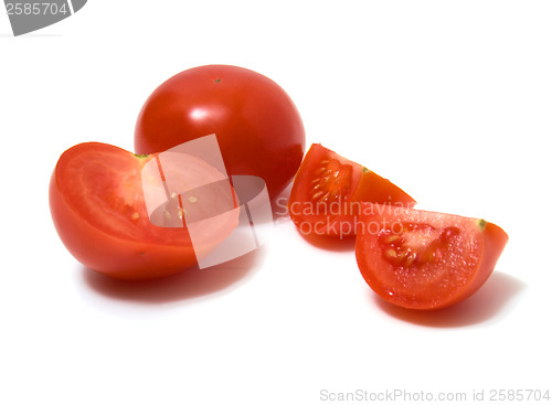 Image of sliced tomato isolated on white