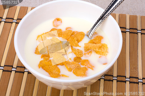 Image of Healthy breakfast. Bowl with corn flakes.