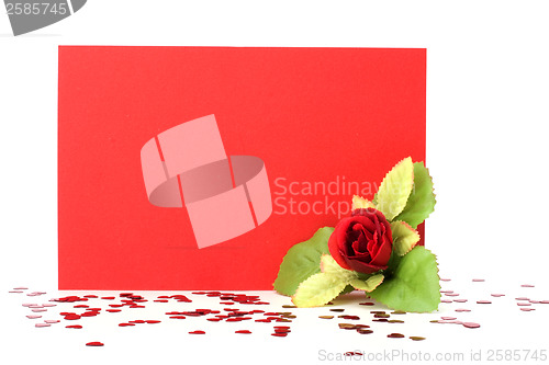 Image of Card with floral decor. Flowers are artificial. 