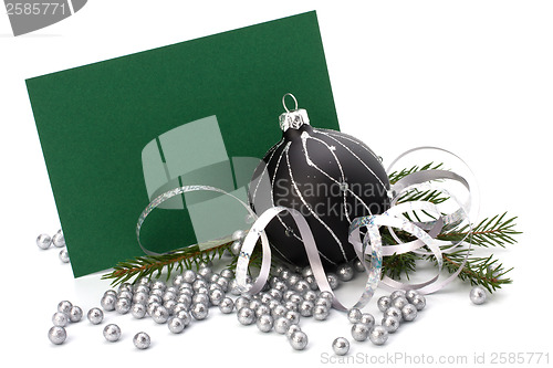 Image of Christmas decoration with greeting card isolated on white backgr