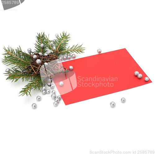 Image of Christmas decoration with greeting card isolated on white backgr