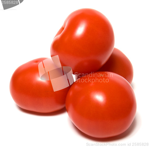 Image of red tomato isolated  on white background 