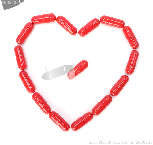Image of red capsules isolated on white background
