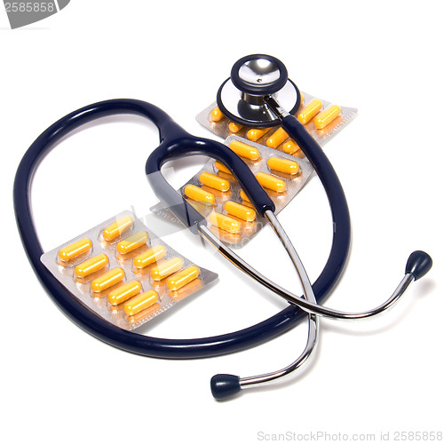 Image of stethoscope and tablets isolated on white background