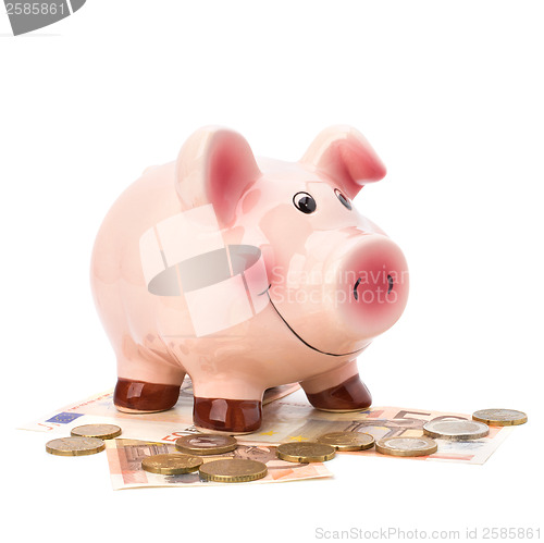 Image of Business concept. Lucky piggy bank isolated on white background.