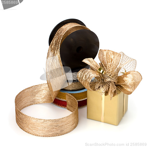 Image of Festive gift box and wrapping ribbons isolated on white backgrou