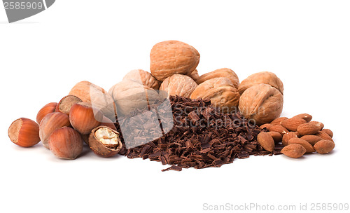 Image of grated chocolate and nuts isolated on white background