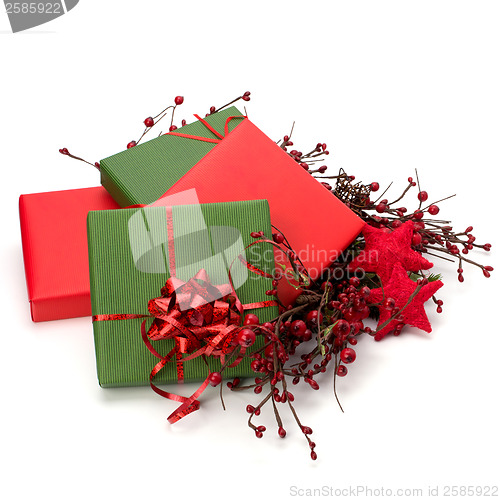 Image of Christmas concept. Ornate gifts isolated on white background. 