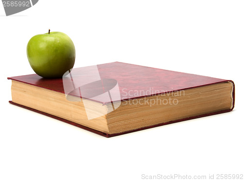 Image of book with apple isolated on white background 
