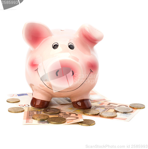 Image of Business concept. Lucky piggy bank isolated on white background.