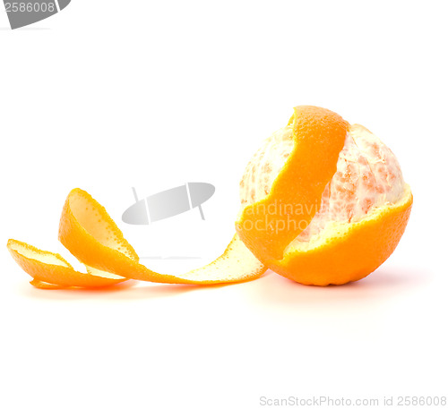 Image of orange with peeled spiral skin isolated on white background