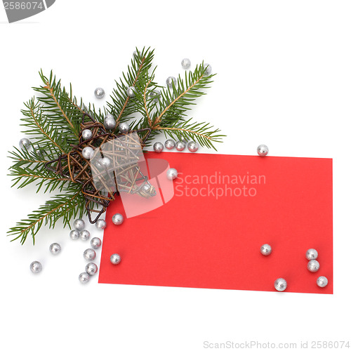 Image of Christmas decoration with greeting card isolated on white backgr