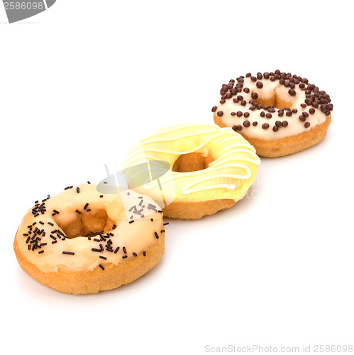 Image of Delicious doughnuts isolated on white background 