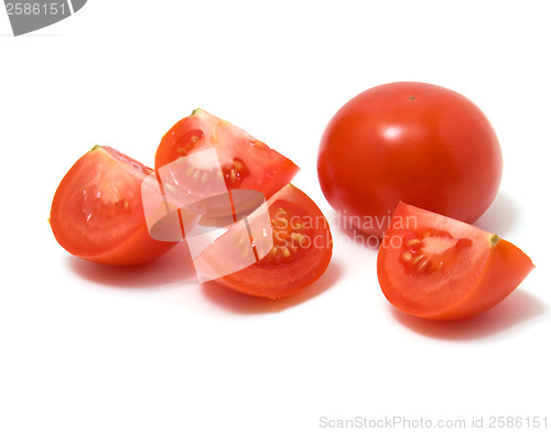 Image of sliced tomato isolated on white