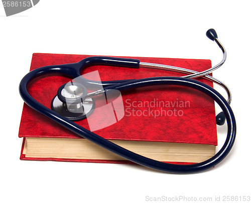 Image of stethoscope on red book isolated on white background