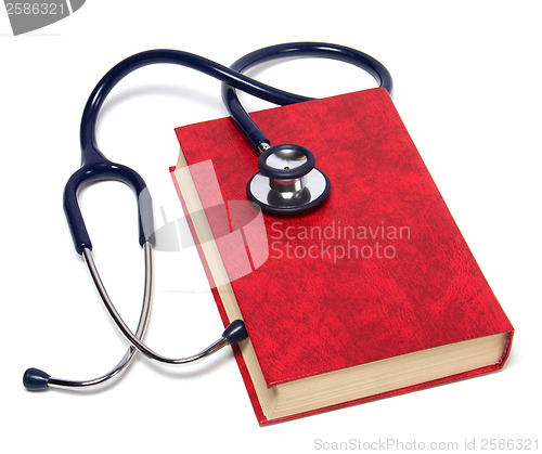 Image of stethoscope on red book isolated on white background