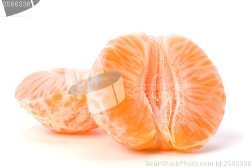 Image of peeled mandarin segments isolated on white background