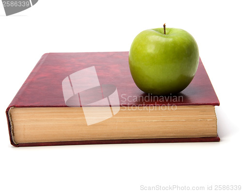 Image of book with apple isolated on white background 