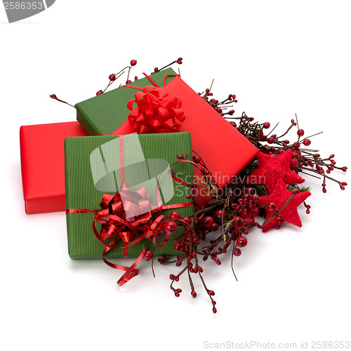 Image of Christmas concept. Ornate gifts isolated on white background. 