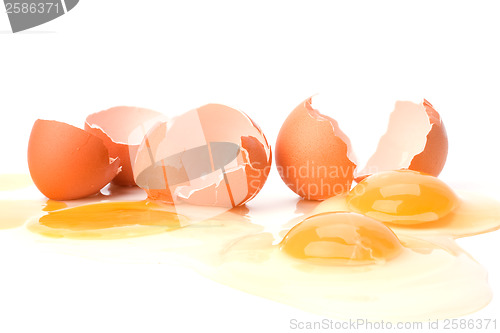 Image of broken eggs isolated on white background